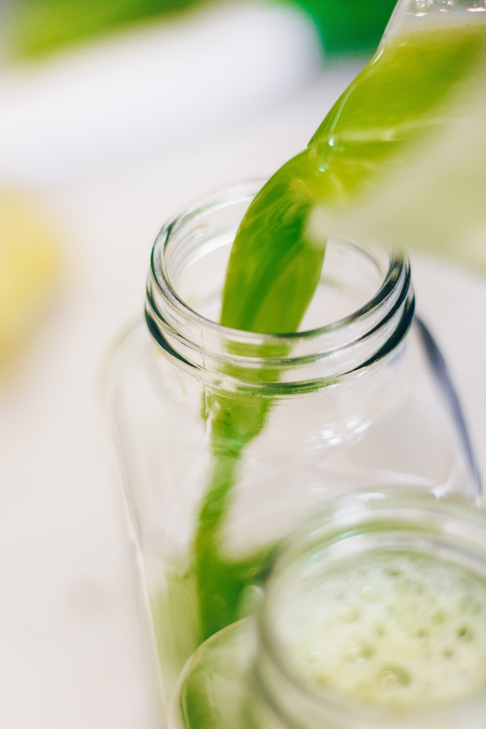 Pouring fresh green juice at Green Lane Co.